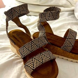 Tried on. Never worn.